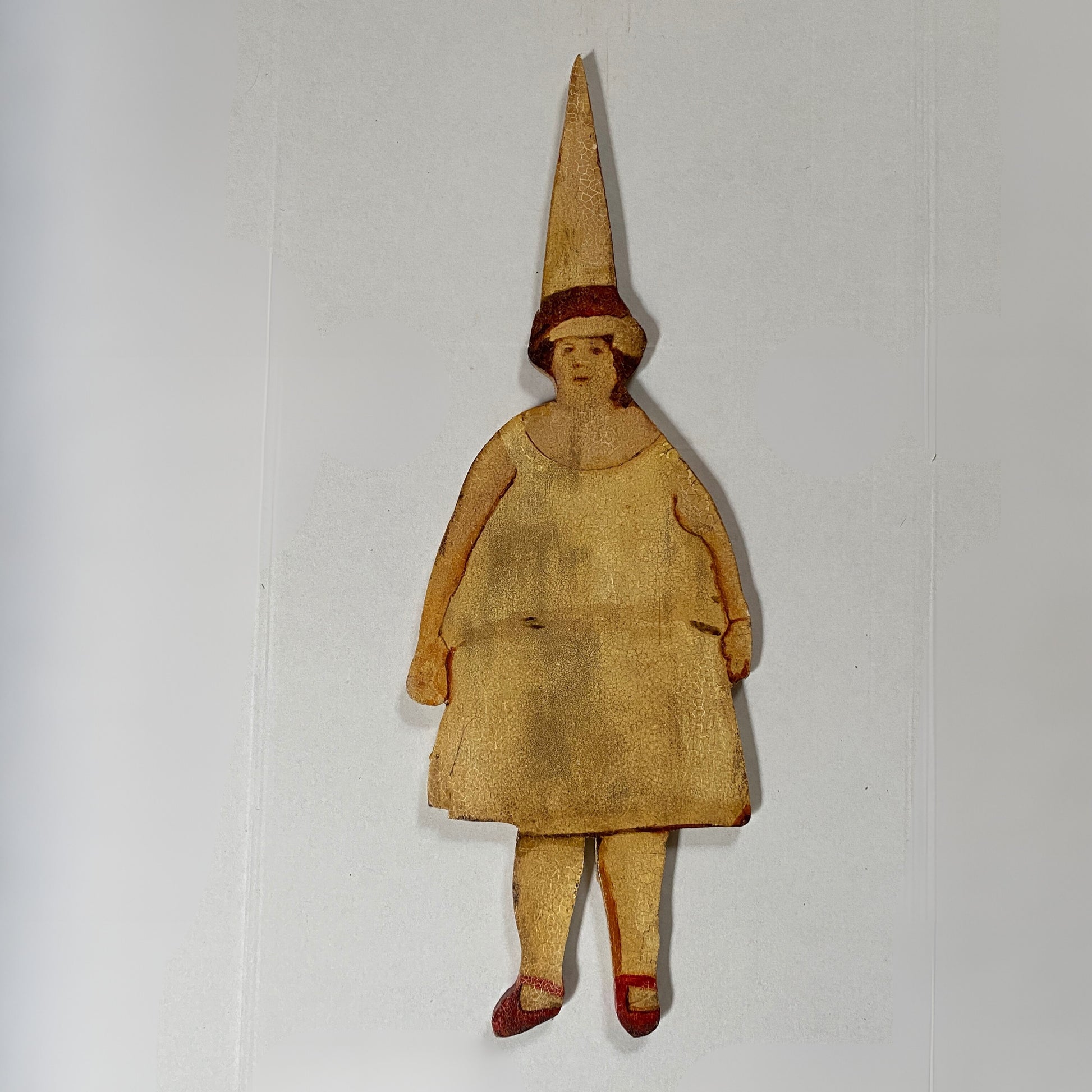 Stella and Madge original oil painting on wood panel, dual-character with cone shaped hat is an outsider art piece with contrasting perspectives